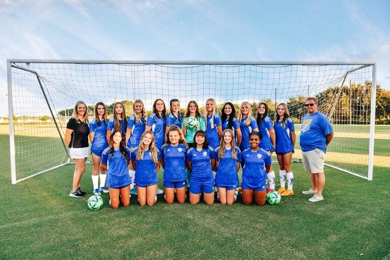 The Auburndale U15 girls soccer team advanced to the southern regionals for the first time in program history over the weekend.  From the back row from left to right are: Coach Kristi Durden, Parker Purdie, Alyssa Herrera, Aubrey Skipper, Elizabeth Bentley, Copeland Collany, Addyson Crawford, Harley Head, Zoriana Rios, Tyla O'Leary, Kylar Sanders, Brooke Barrett and Coach Bill Johnson.  In the front row from left to right are: Hayleigh Belt, Brook Shannon, Sayler Durden, Areha Smith, Mary Tilghman and Izzi Liparota.