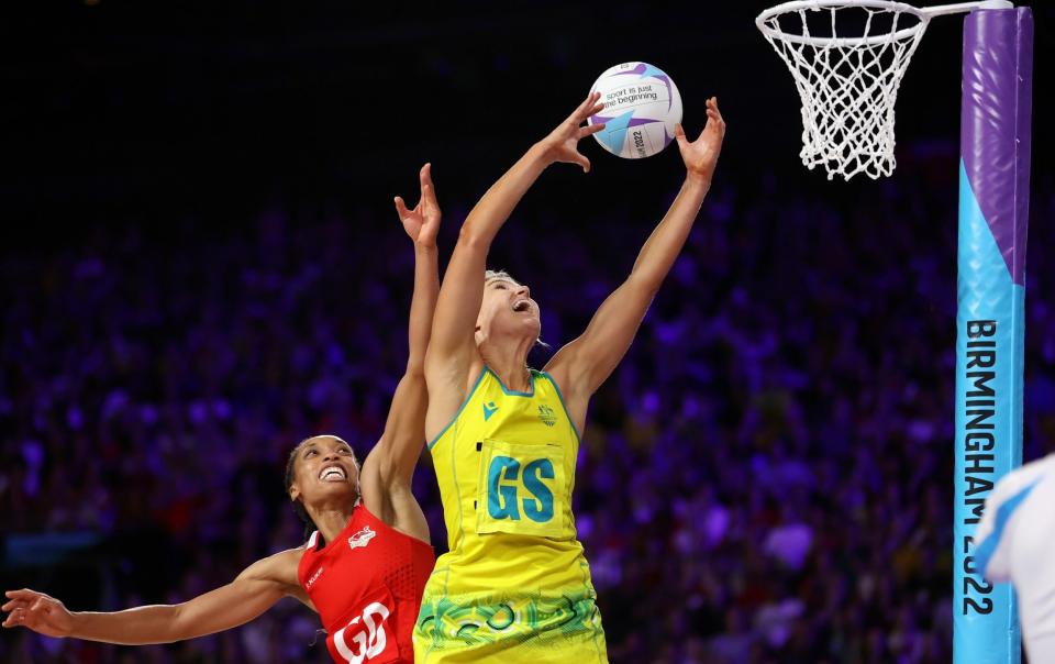 Gretel Bueta of Team Australia and Layla Guscoth of Team England compete for the ball during the Netball Semi-Final match between Team England and Team Australia on day nine of the Birmingham 2022 Commonwealth Games at NEC Arena on August 06, 2022 on the Birmingham, England - Getty Images Europe 