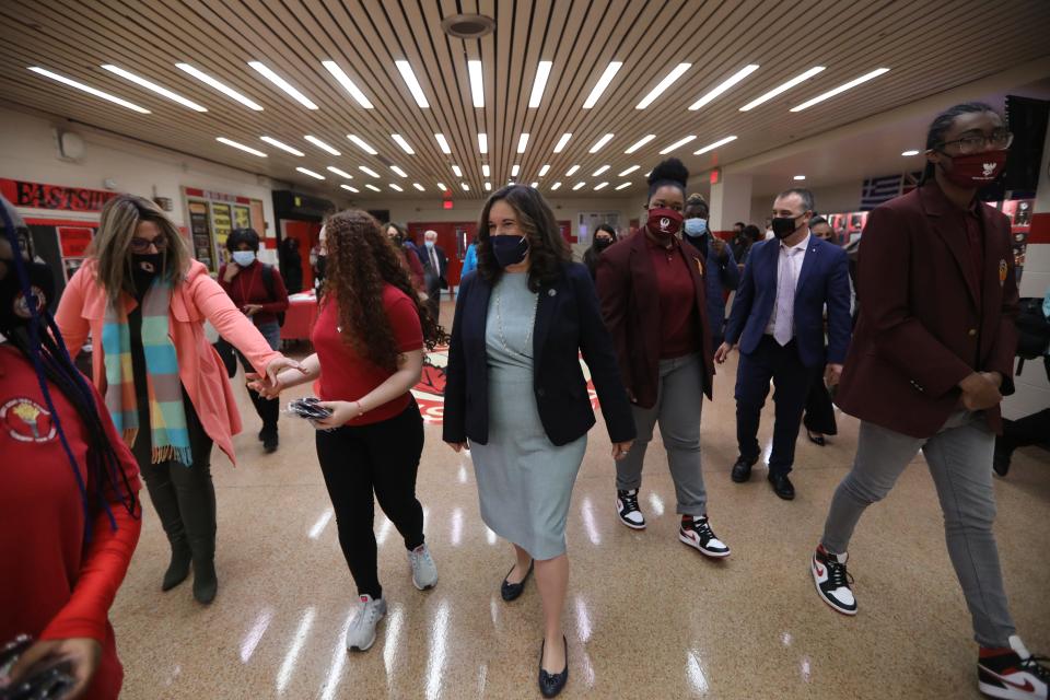 Deputy Secretary of Education, Cindy  Marten (center), arrives at East Side High School, in Newark.  Wednesday, March 30, 2022