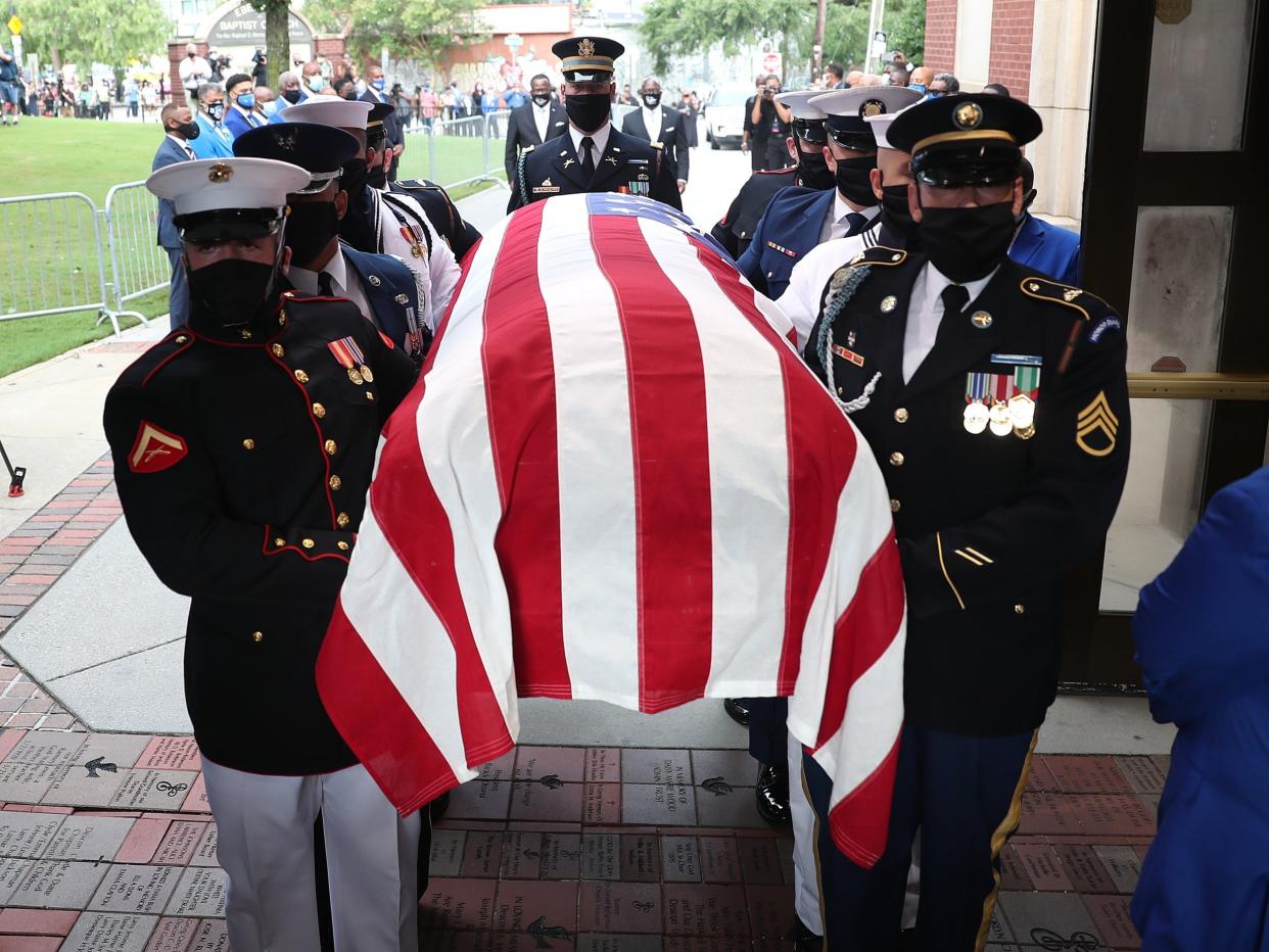 Members of the joint services military honour guard carry the casket of John Lewis into the Ebenezer Baptist Church on July 30, 2020 in Atlanta, Georgia: Getty Images