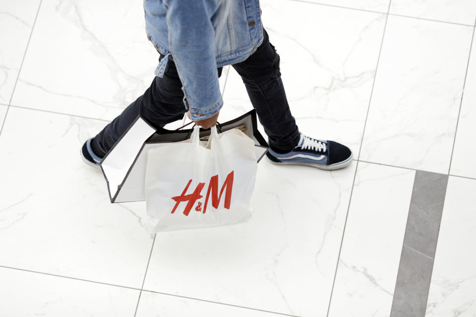 (Bloomberg) -- Hennes & Mauritz AB surged after the struggling Swedish clothing retailer showed progress coping with a buildup of unsold garments, raising hopes that the worst may be over after a three-year slump in earnings.Inventory dropped slightly as a proportion of sales, easing to 18.2% at the end of May from a record 18.9% as of last August, H&M said Thursday. Chief Executive Officer Karl-Johan Persson said H&M still aims to boost operating profit this year. The stock rose as much as 11% Thursday in Stockholm.A pickup in revenue growth at the start of the third quarter, helped by a heat wave in Europe, is boosting optimism that the retailer may have returned to a level of sales growth that could gradually put the inventory issue behind it. H&M pledged to reduce discounts for a fourth consecutive quarter as it aims to reduce its 40-billion kronor ($4.5 billion) buildup of unsold garments.Analysts pointed to the June revenue growth of 12% as the trigger for the share gain. The stock can be volatile because short sellers have targeted H&M, betting against almost a fifth of the freely traded shares.Better CompositionThe retailer said that the composition of inventory has improved, implying it will become easier to sell the garments. The family-controlled company has a goal of eventually reducing stock-in-trade to 12% to 14% of sales, a level last seen three years ago. When asked in an interview if that could take four of five years, CEO Persson said it should be less than that, saying he’s “confident” H&M is heading in the right direction.“H&M is improving its offer, which should lead to a sales and earnings recovery in time, albeit with execution risk in an ongoing tough competitive environment,” wrote Richard Chamberlain, an analyst at RBC Europe.The company has recently been offering discounts of up to half off on summer clothes, offering $1.99 camisole tops, $25.99 faux leather biker jackets and skinny jeans for $8.99.H&M also cut this year’s store expansion plan by 26% while pledging more investment in e-commerce. H&M now expects 130 net store openings, further decelerating from a rate that exceeded 400 in recent years. Most of the new H&M shops will be outside of Europe and the U.S. as the retailer seeks faster-growing markets.H&M has been plowing investment into e-commerce, adding online sales in Mexico, Thailand, Indonesia and Egypt this year.The Swedish retailer is trying to catch up after Zara owner Inditex SA made it possible to order clothes from its chains from virtually anywhere in the world. H&M’s e-commerce reach extends to about 48 markets.Inditex has forecast sales growth of 4% to 6% this year on a like-for-like basis as the Spanish retailer outperforms rivals such as Gap Inc.H&M is also trying to catch up with Inditex’s lead in RFID, a technology that allows retailers to track the location of clothes in stores and warehouses to boost efficiency. The Swedish retailer said it now uses RFID in 15 markets. Zara uses it in all its stores.The Swedish retailer said it plans to launch H&M on Indian e-commerce platform Myntra and its & Other Stories chain on China’s Tmall by this autumn.H&M warned that the weak krona is still pushing up buying costs as the retailer buys the bulk of its garments in Asia, where prices are linked to dollars. The krona was on average about 10% weaker against the dollar in the second quarter.Pretax profit dropped 1.3% in the three months through May, missing analysts’ estimates and declining an eighth consecutive quarter.To contact the reporters on this story: Thomas Mulier in Geneva at tmulier@bloomberg.net;Hanna Hoikkala in Stockholm at hhoikkala@bloomberg.netTo contact the editors responsible for this story: Eric Pfanner at epfanner1@bloomberg.net, John J. Edwards IIIFor more articles like this, please visit us at bloomberg.com©2019 Bloomberg L.P.