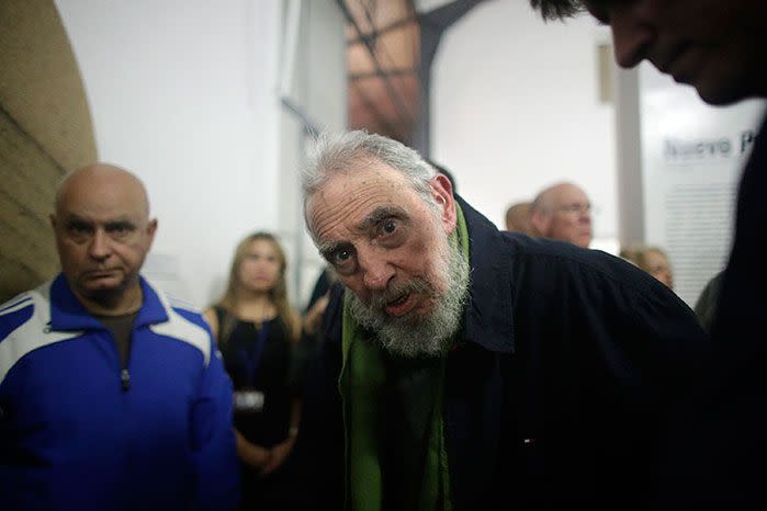 Fidel Castro looks at the camera during a rare public appearance to attend the inauguration of an art gallery on January 8, 2014 in Havana, Cuba. Image: Getty