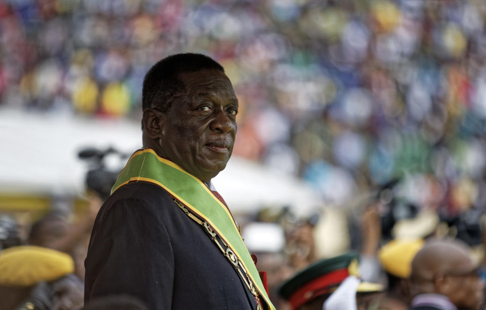 <p>Emmerson Mnangagwa inspects the military parade after being sworn in as President at the presidential inauguration ceremony in the capital Harare, Zimbabwe Friday, Nov. 24, 2017. (Photo: Ben Curtis/AP) </p>