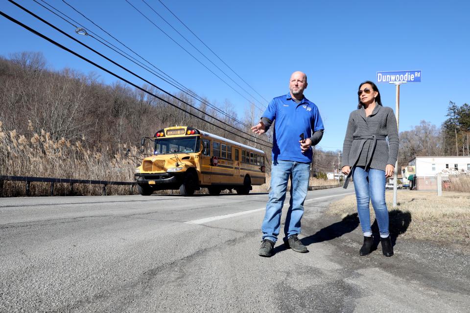 Town of Kent Supervisor Jaime McGlasson, right, and Councilman Shaun Boyd stand beside a stretch of Route 52 that will get resurfaced Feb. 10, 2023 in Kent. The town received $3.6 million from the state to resurface Route 52 from Route 311 to Fowler Avenue.