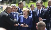 Germany's Chancellor Angela Merkel, Kosovo's President Hashim Thaci and Serbian President Aleksandar Vucic pose among other heads of state during the family photo at the EU-Western Balkans Summit in Sofia, Bulgaria, May 17, 2018. Vassil Donev/Pool via Reuters