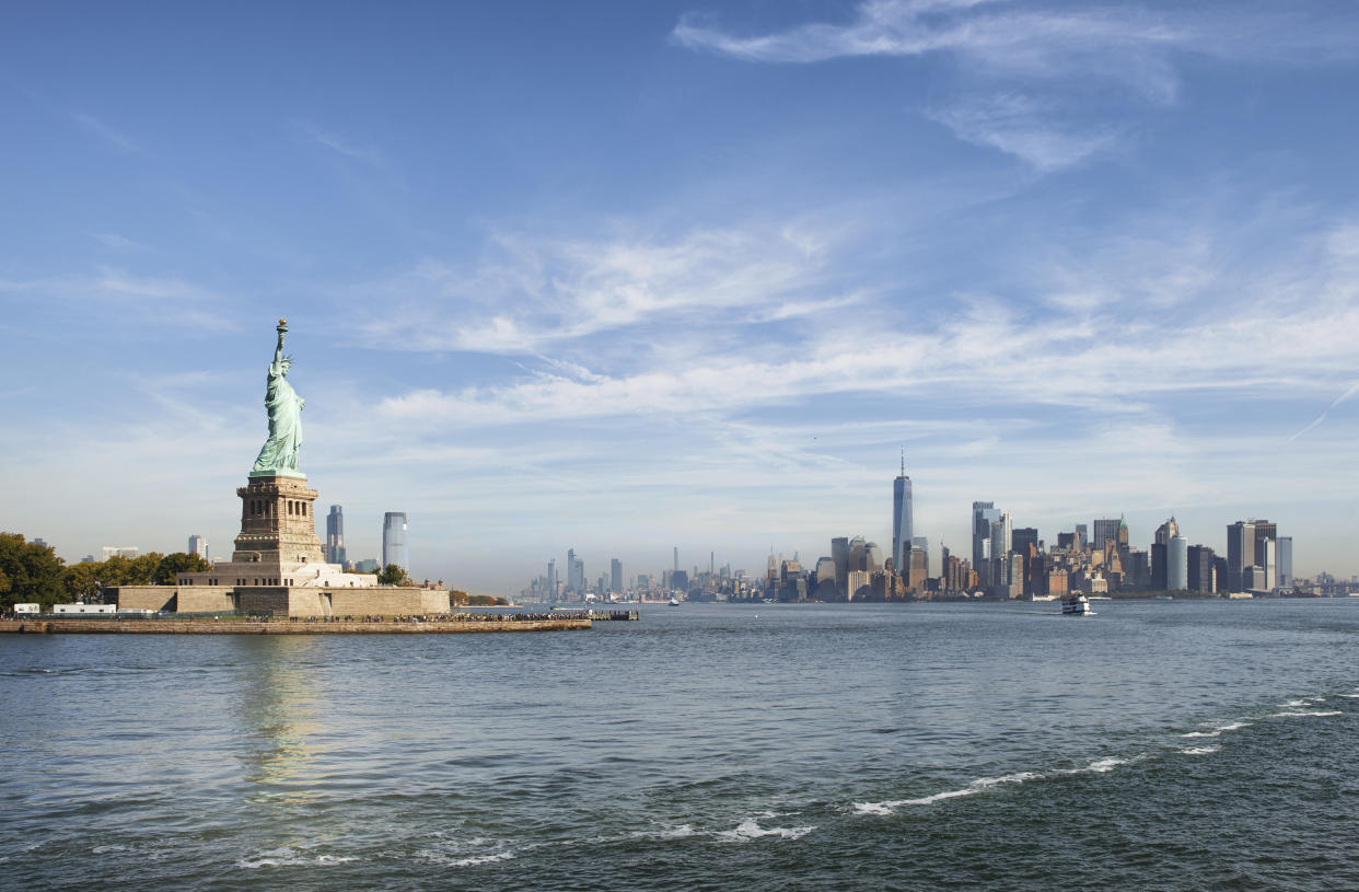 Statue of Liberty and Lower Manhattan Skyline, New York City, United States. (Photo: Gettyimages)