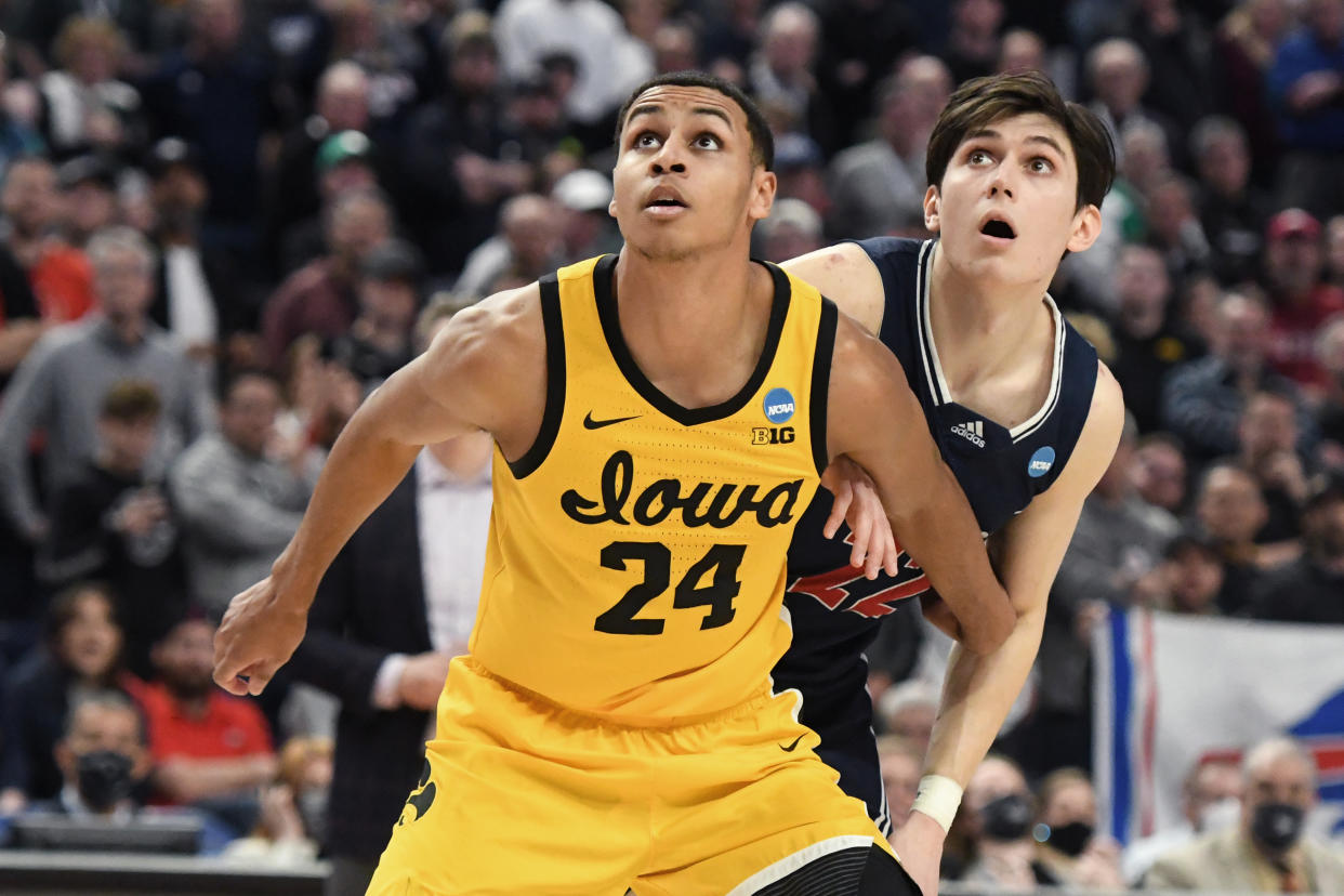 Iowa's Kris Murray fights for position with Richmond's Andre Gustavson during a first-round game of the 2022 NCAA men's basketball tournament at KeyBank Center in Buffalo, New York, on March 17, 2022. (Mitchell Layton/Getty Images)