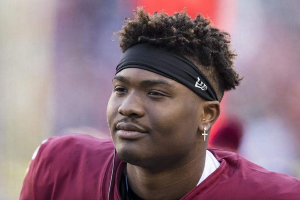 Dwayne Haskins #7 of the Washington Football Team looks on from the sidelines after being injured during the second half of the game against the <a class="link " href="https://sports.yahoo.com/nfl/teams/ny-giants/" data-i13n="sec:content-canvas;subsec:anchor_text;elm:context_link" data-ylk="slk:New York Giants;sec:content-canvas;subsec:anchor_text;elm:context_link;itc:0">New York Giants</a> at FedExField on December 22, 2019 in Landover, Maryland. (Photo by Scott Taetsch/Getty Images)