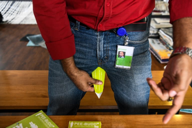 Founder of 'Pee Buddy' Deep Bajaj shows how to use a portable female urination device