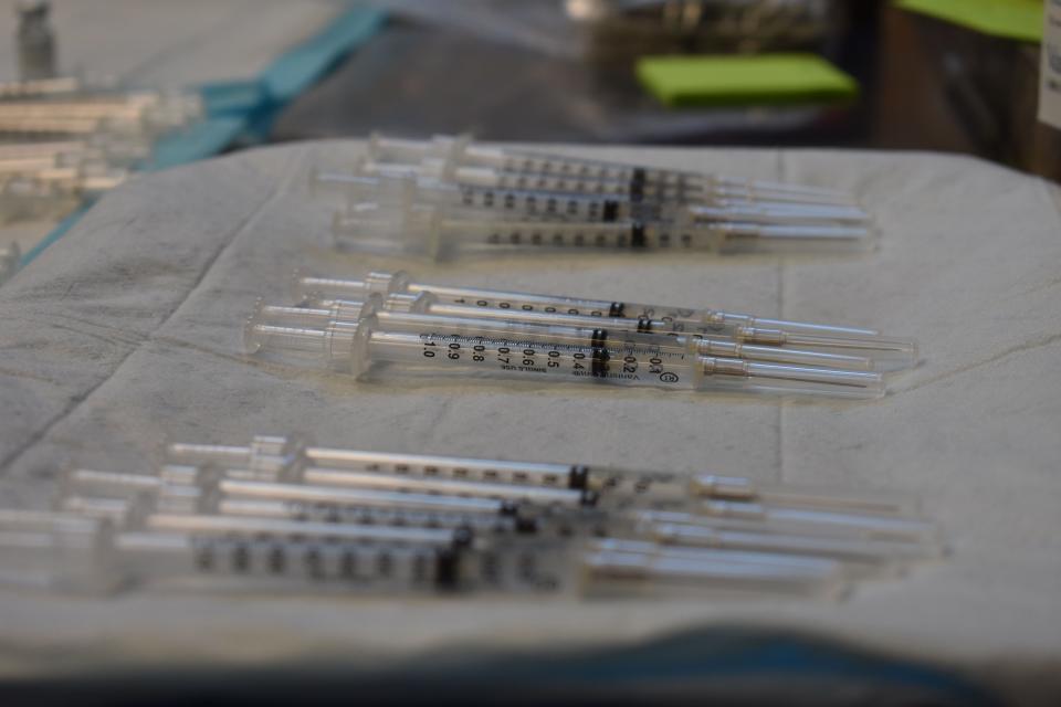 Doses of the Pfizer COVID-19 vaccine sit at the ready at a long-term vaccination clinic at the Fort Pierce Recreation Center, Wednesday, March 24, 2021. The city of Fort Pierce partnered with the Florida Division of Emergency Management to organize the clinic, which opened March 22 and is operated by disaster management firms AshBritt and IEM.