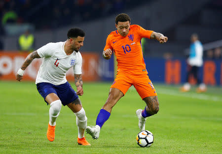 Soccer Football - International Friendly - Netherlands vs England - Johan Cruijff Arena, Amsterdam, Netherlands - March 23, 2018 Netherlands' Memphis Depay in action with England’s Kyle Walker REUTERS/Michael Kooren