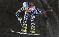 Argentina's Macarena Simari Birkner goes airborne during the downhill run of the women's alpine skiing super combined event at the 2014 Sochi Winter Olympics at the Rosa Khutor Alpine Center February 10, 2014. REUTERS/Stefano Rellandini (RUSSIA - Tags: OLYMPICS SPORT SKIING)