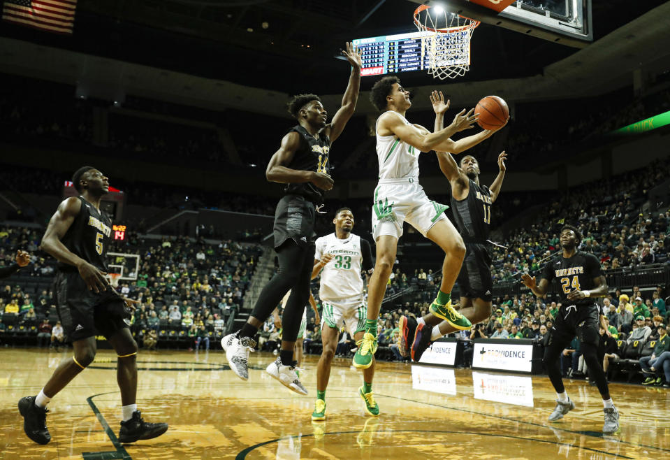 Oregon guard Will Richardson (0), shoots against Alabama State during the first half of an NCAA college basketball game Sunday, Dec. 29, 2019, in Eugene, Ore. (AP Photo/Thomas Boyd)