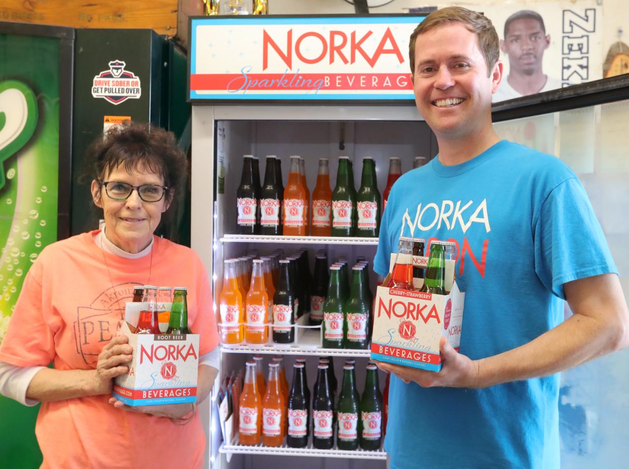 The Peanut Shoppe owner Marge Klein and NORKA President Michael Considine on Friday, May 3, 2024, in Akron, Ohio. [Phil Masturzo/ Beacon Journal]