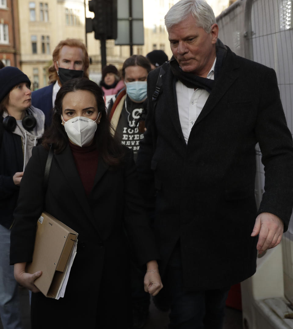 Stella Moris girlfriend of Julian Assange, left, with Wikileaks spokesman Kristinn Hrafnsson, leave Westminster Magistrates Court after Assange was denied bail at a hearing in the court, in London, Wednesday, Jan. 6, 2021. On Monday Judge Vanessa Baraitser ruled that Julian Assange cannot be extradited to the US. because of concerns about his mental health. Assange had been charged under the US's 1917 Espionage Act for "unlawfully obtaining and disclosing classified documents related to the national defence". Assange is still in custody. (AP Photo/Matt Dunham)