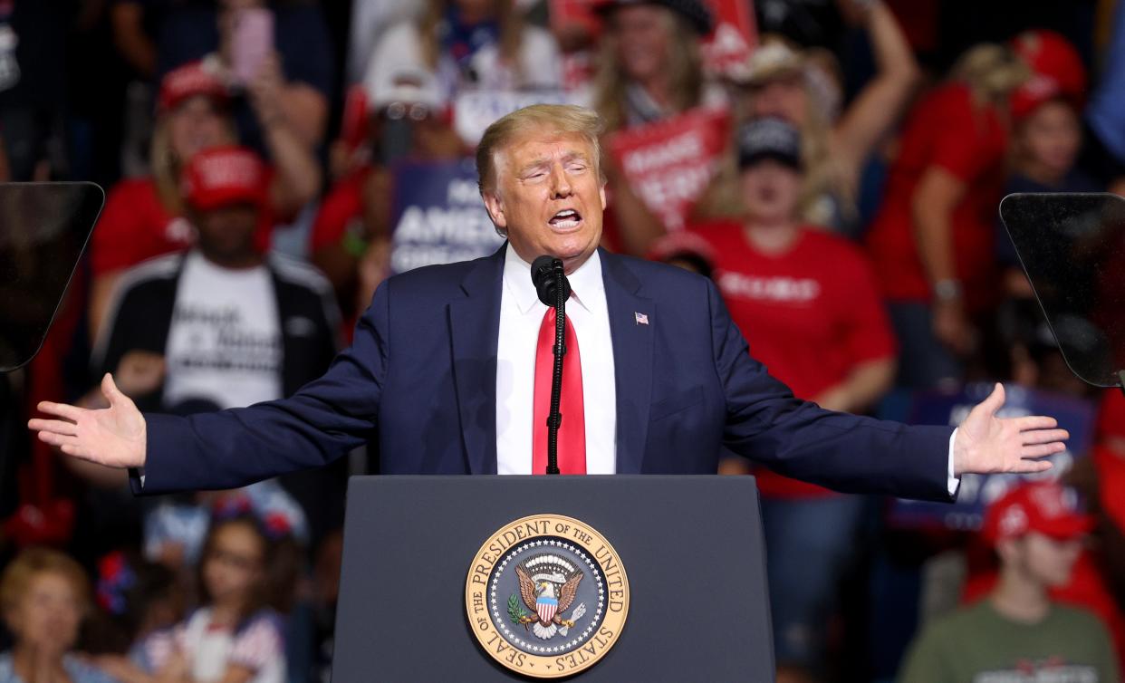 Then-US President Donald Trump arrives at  a campaign rally at the BOK Center, 20 June, 2020 in Tulsa, Oklahoma.  (Getty Images)