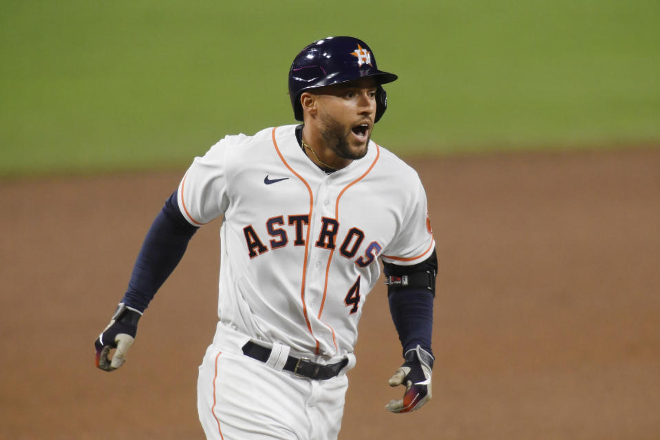 SAN DIEGO, CALIFORNIA - OCTOBER 14: George Springer #4 of the Houston Astros rounds the bases after hitting a two run home run off Tyler Glasnow #20 of the Tampa Bay Rays during the fifth inning in Game Four of the American League Championship Series at PETCO Park on October 14, 2020 in San Diego, California. (Photo by Harry How/Getty Images)