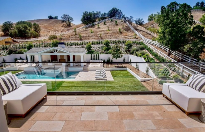 Stunning view of pool and hills from patio. (Photo: Trulia)