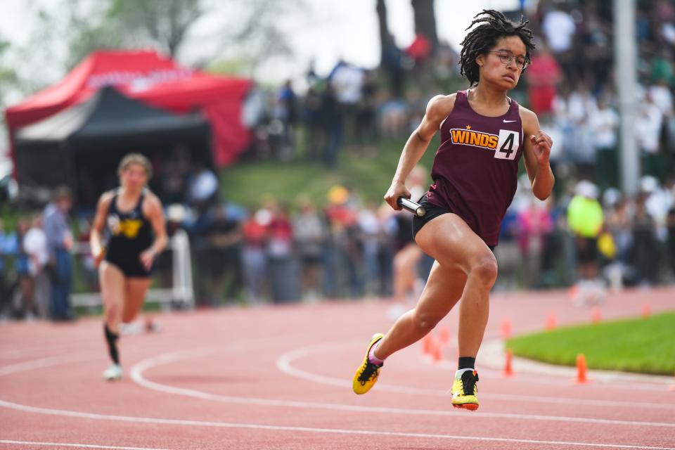 Windsor's Maya Brasch runs the first leg of the Class 4A girls 4x400 meter relay at the Colorado high school track and field state meet at Jeffco Stadium on Saturday, May 20, 2023, in Lakewood, Colo. The Wizards placed second.