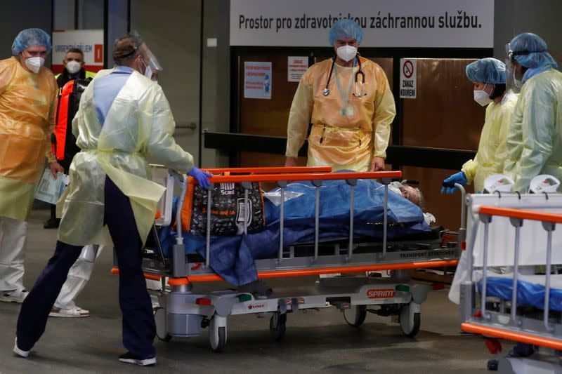Medical staff members transport COVID-19 patients from Brno to Prague