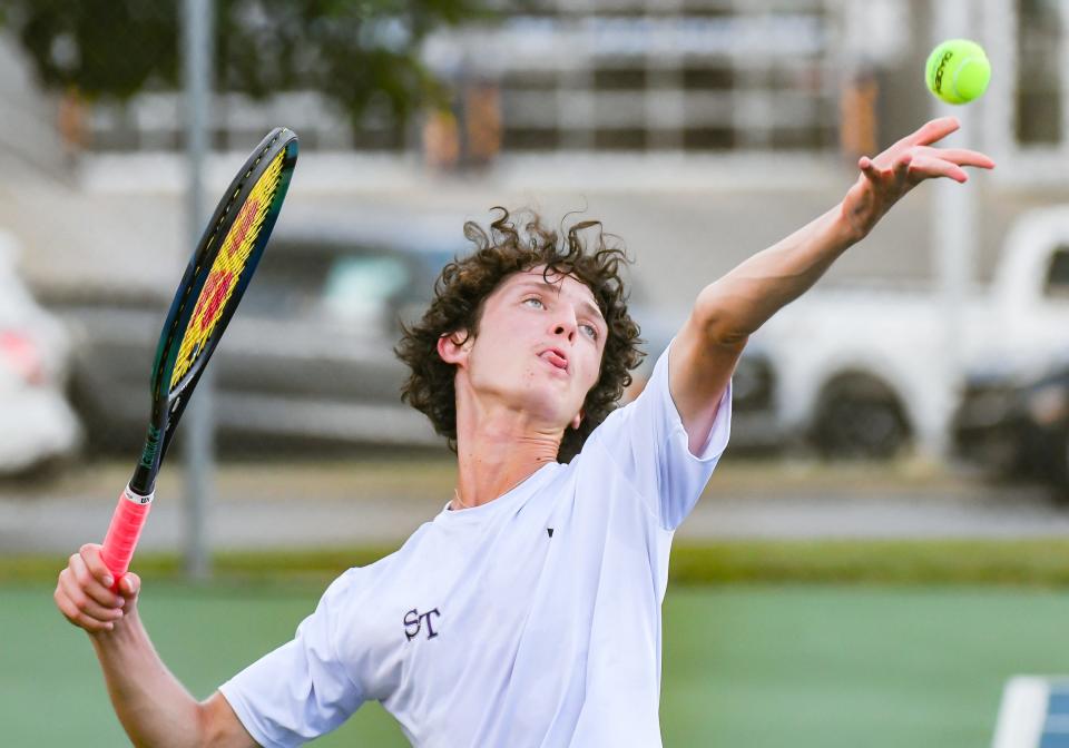 Bloomington South’s David Ciucu hits a shot during his No. 1 singles match against Bloomington North’s Connor O’Guinn during the tennis match at South on Tuesday, September 5, 2023.