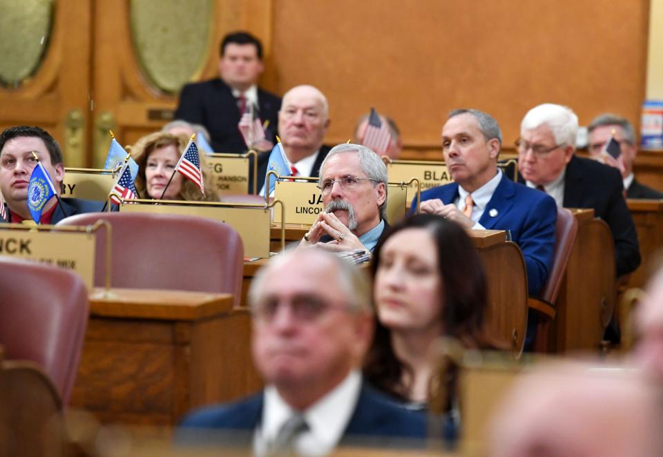 Lawmakers listen as Governor Kristi Noem gives the annual budget address on Tuesday, December 6, 2022, at the South Dakota State Capitol in Pierre.