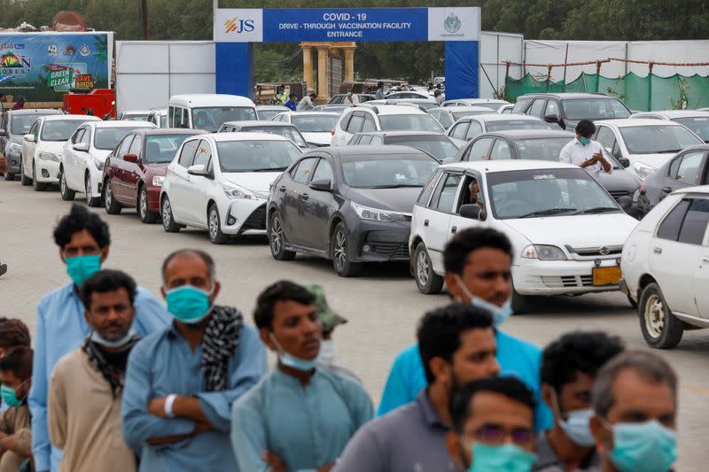 Coronavirus disease (COVID-19) drive-through vaccination facility in Karachi