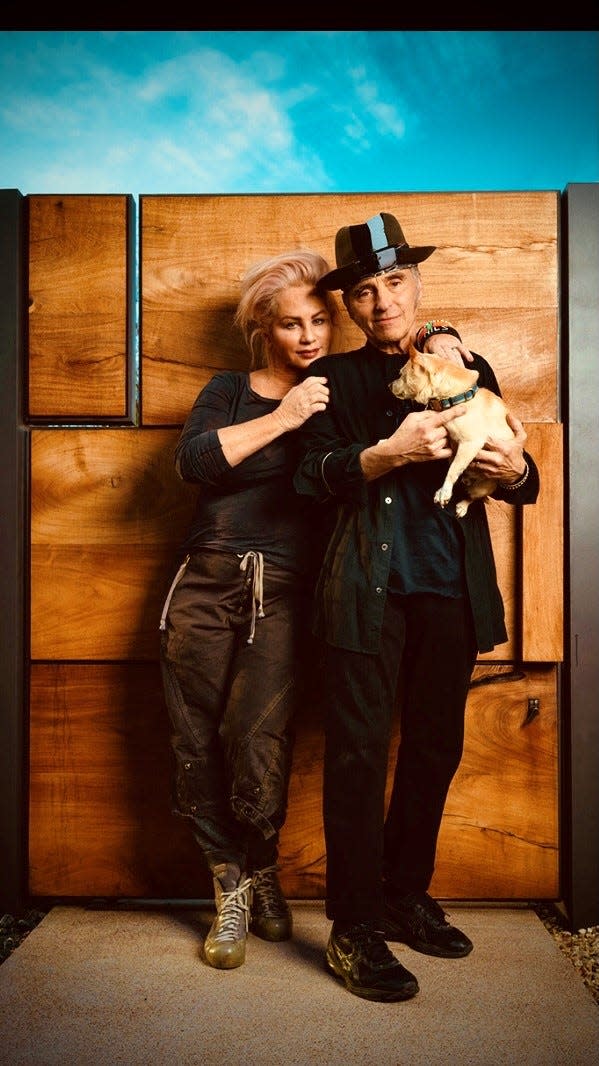 Amy Aiello Lofgren and Nils Lofgren with Outlaw Pete (in collar).