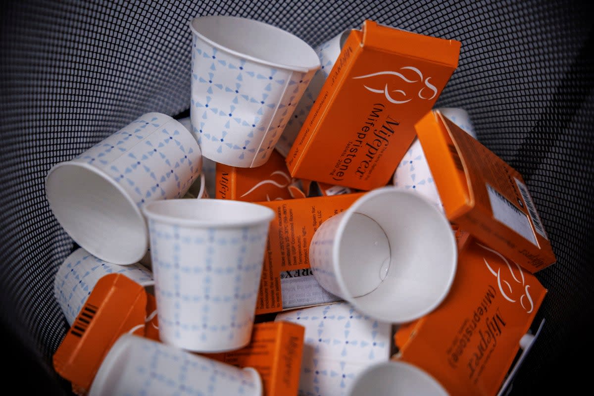 Used boxes of mifepristone pills, the first drug used in a two-drug medical abortion protocol, fill a bin at Alamo Women’s Clinic in Albuquerque, New Mexico.  (REUTERS)