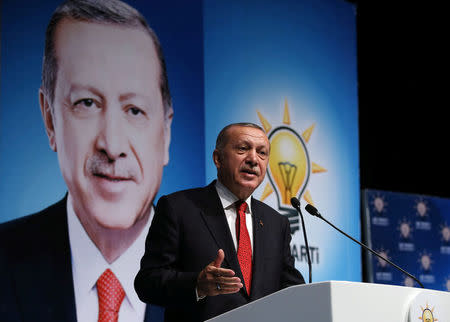 Turkish President Tayyip Erdogan addresses members of his ruling AK Party in Rize, Turkey August 11, 2018. Murat Kula/Presidential Palace/Handout via REUTERS