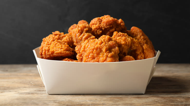 fried chicken in cardboard container