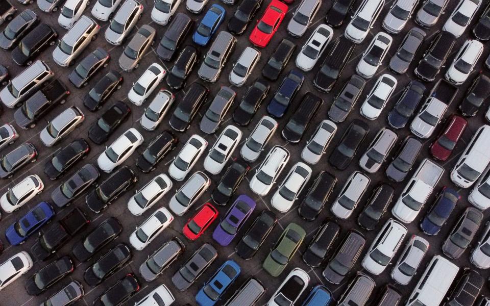 Rental cars in a parking lot of the Dodgers Stadium during the coronavirus pandemic in Los Angeles, California - ETIENNE LAURENT/EPA-EFE/Shutterstock