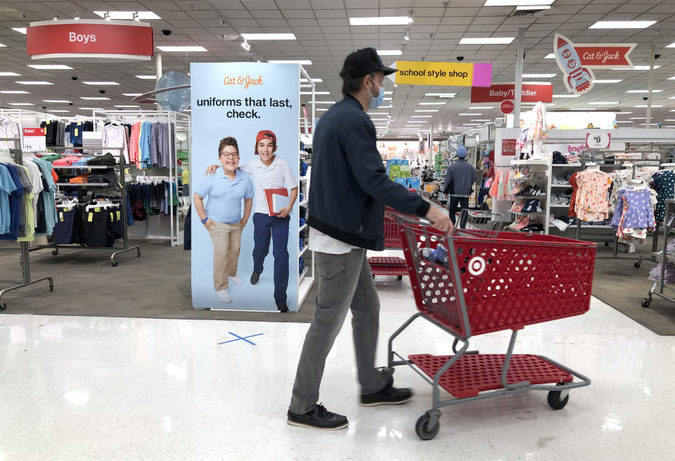 COLMA, CALIFORNIA - AUGUST 03: An advertisement for back-to-school uniforms is displayed at a Target store on August 03, 2020 in Colma, California. In the midst of the ongoing coronavirus pandemic, back-to-school shopping has mostly moved to online sales, with purchases shifting from clothing to laptop computers and home schooling supplies. (Photo by Justin Sullivan/Getty Images)