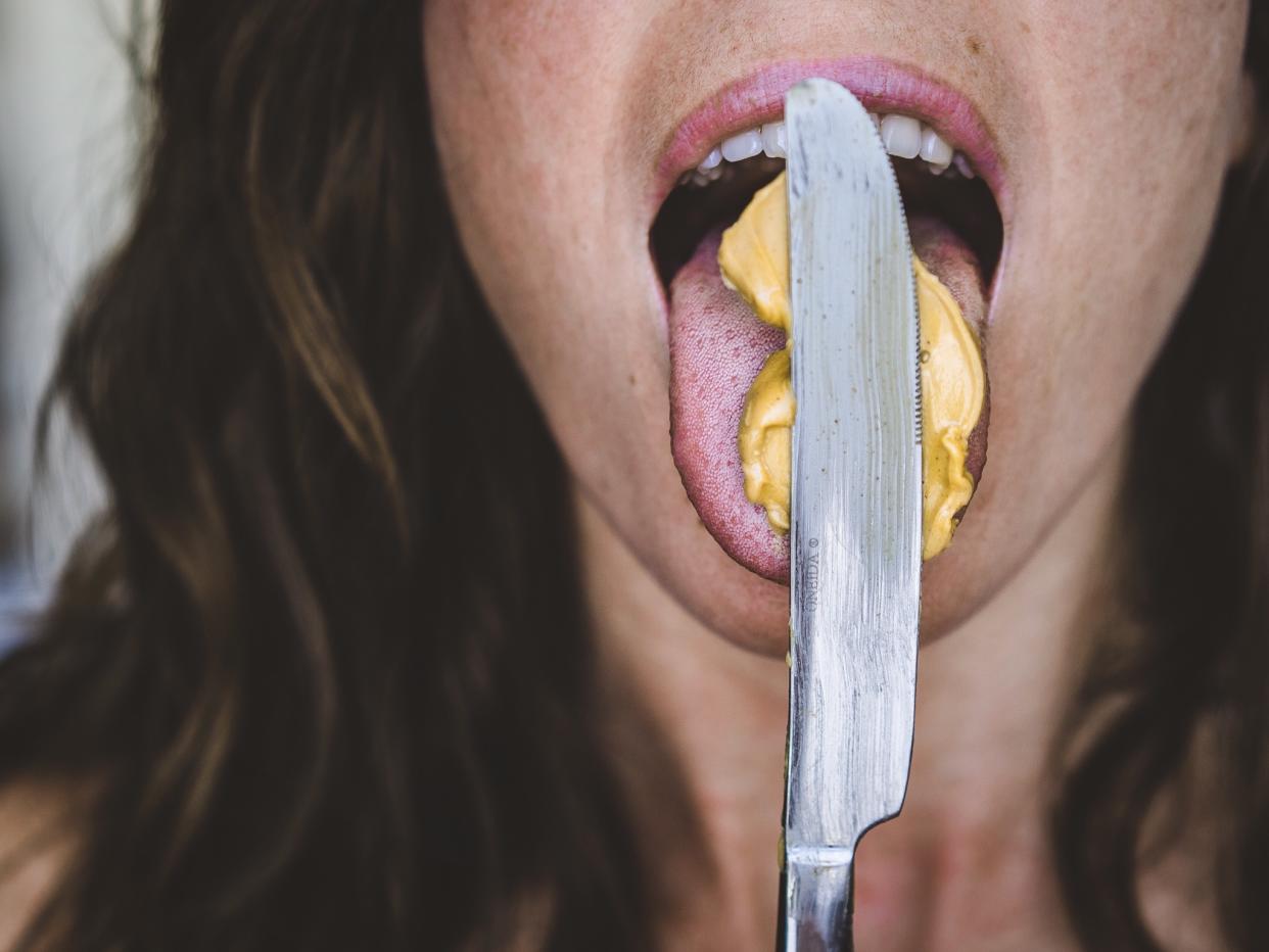 People are still grossed-out by people licking food off their knife. (Getty Images)