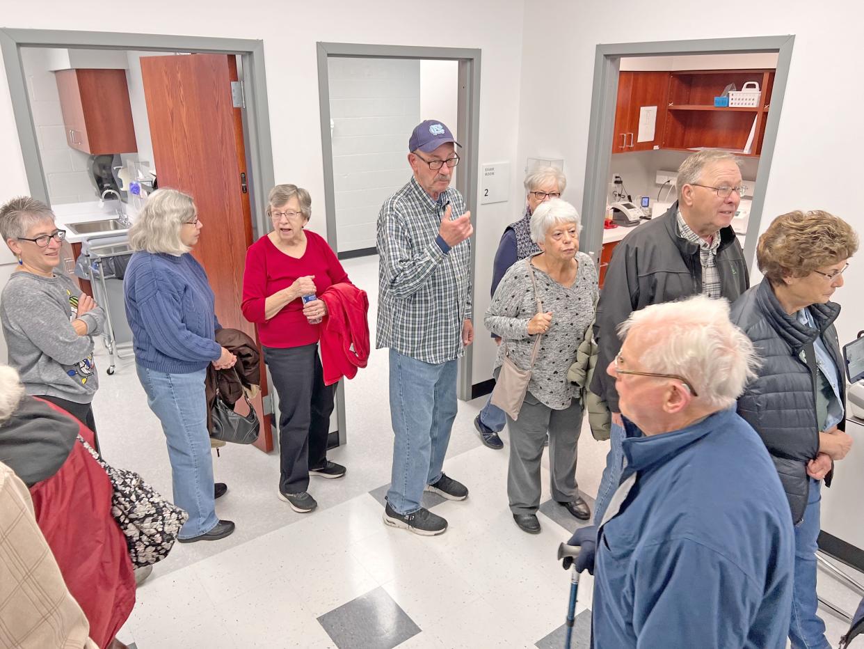 Visiitors tour the new Nationwide Children's Hospital school-based health center for Shelby City Schools.