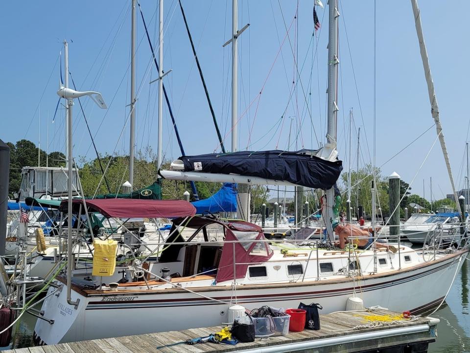 This photo released by the U.S. Coast Guard, shows the sailboat Kyklades. The U.S. Coast Guard is searching for Virginia Beach natives Yanni Nikopoulos and Dale Jones who were aboard the boat and reported overdue after they failed to return when expected from a sailing trip to Portugal’s Azores. (Courtesy of the U.S. Coast Guard)