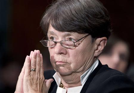 SEC Chair Mary Jo White testifies at a Senate Banking, Housing and Urban Affairs Committee hearing on Capitol Hill in this July 30, 2013 file photo. REUTERS/Jose Luis Magana/Files