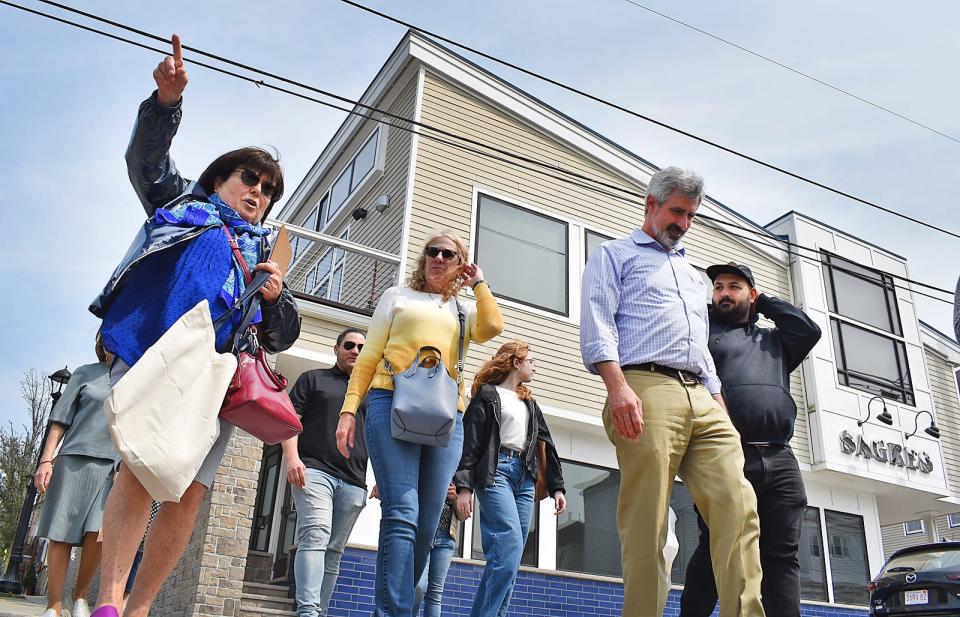 Bristol Community College professor Odete Amarelo guides the Taste of Portugal Food Tour of Columbia Street Friday, May 19.