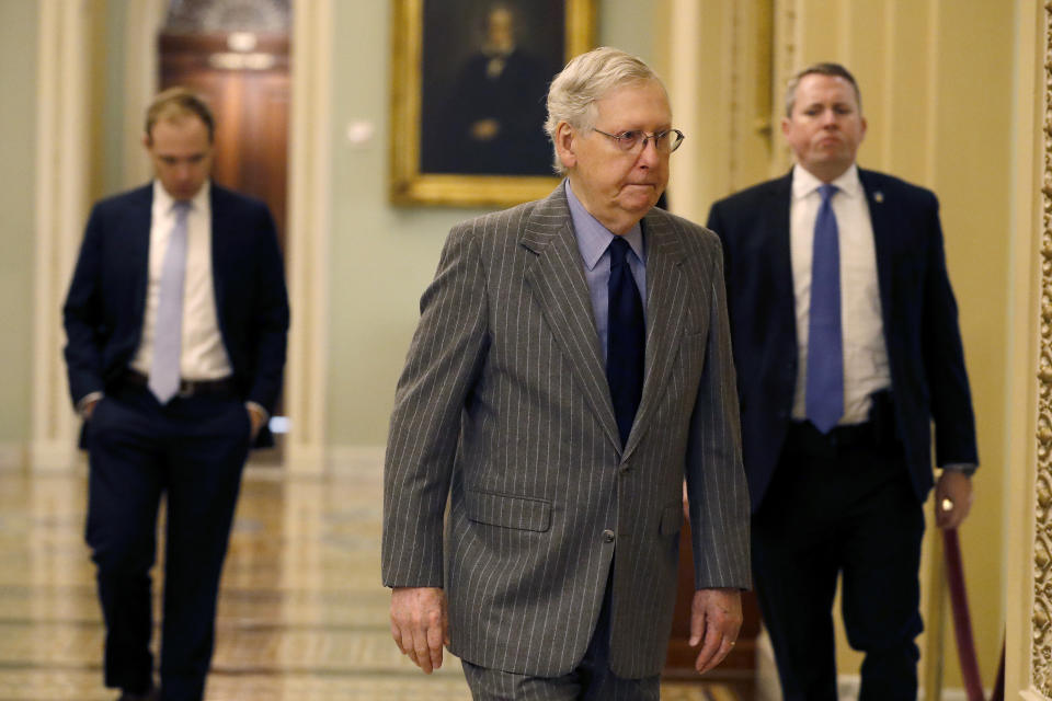 Senate Majority Leader Mitch McConnell, R-Ky., arrives at the Capitol, in Washington, Wednesday, Jan. 15, 2020. Speaker of the House Nancy Pelosi, D-Calif., is set to announce the House prosecutors for the Senate impeachment trial of President Donald Trump. (AP Photo/Julio Cortez)