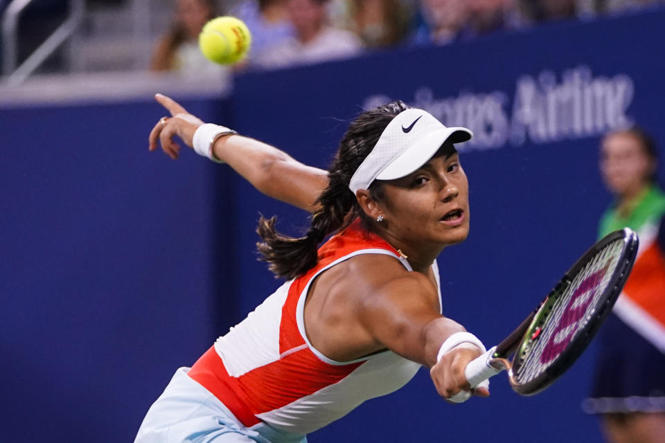 Emma Raducanu, of Britain, returns a shot to Alize Cornet, of France, during the first round of the US Open tennis championships, Tuesday, Aug. 30, 2022, in New York. (AP Photo/Frank Franklin II)