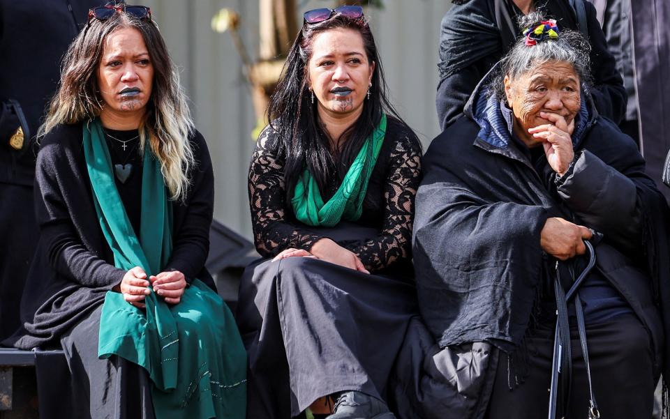 Members of the Maori community gather after the news of Kiingi Tuheitia's death at the Turangawaewae Marae in Ngaruawahia, New Zealand