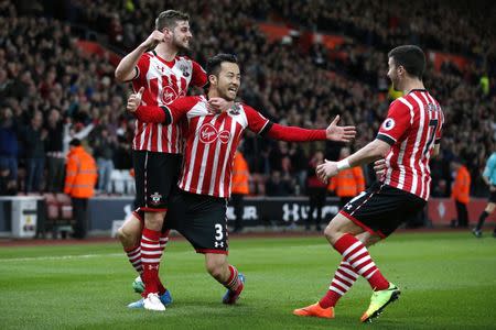 Britain Soccer Football - Southampton v Crystal Palace - Premier League - St Mary's Stadium - 5/4/17 Southampton's Maya Yoshida celebrates scoring their second goal with Jack Stephens Action Images via Reuters / Matthew Childs Livepic