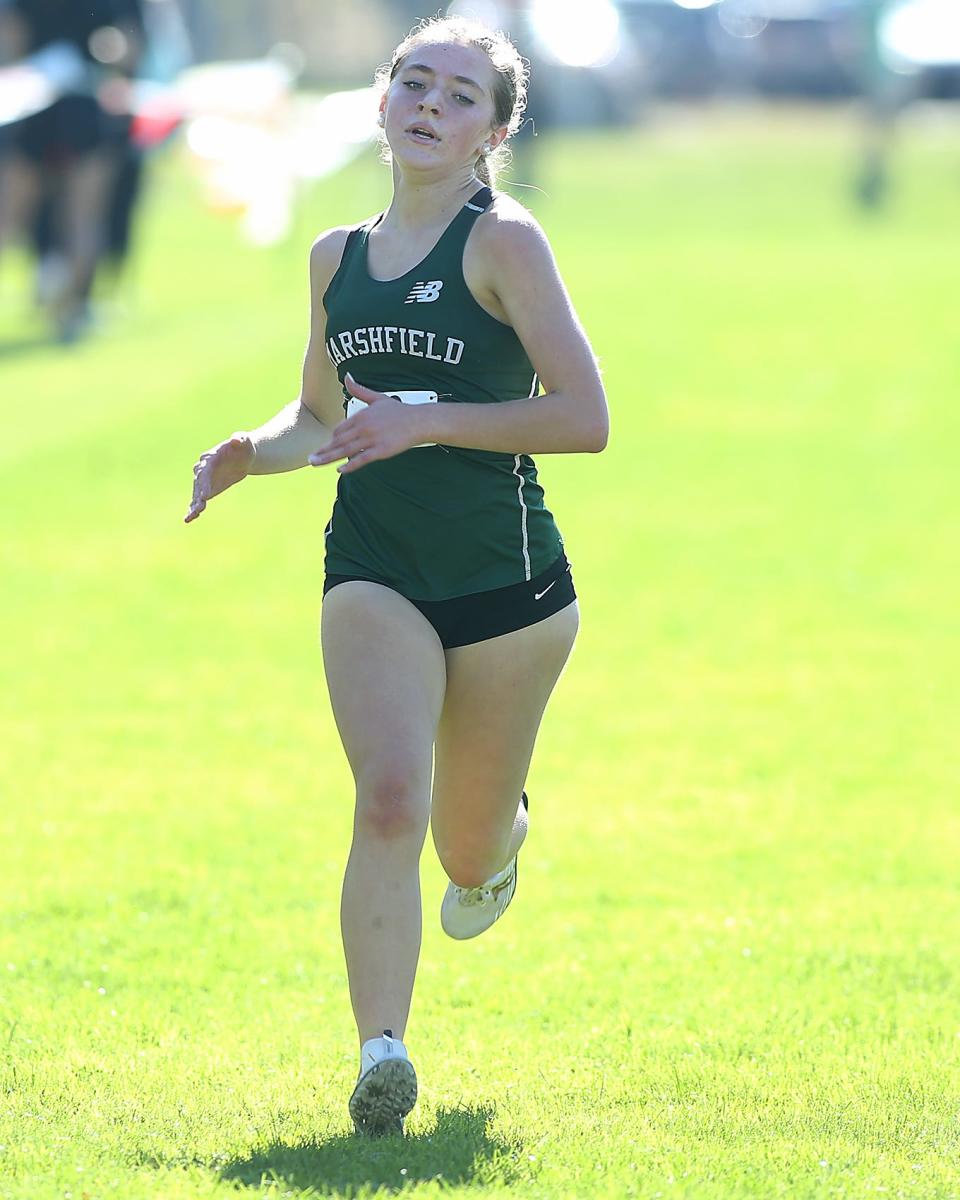 Marshfield’s Ava Brunswick finishes strong to take fourth overall with a time of 19:07.47 during the Patriot League Championship Meet at Hingham High School on Saturday, Oct. 28, 2023. Plymouth South boys would win with 48 points while Marshfield girls would win with 24 points.