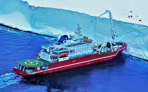 The SA Aguilas II next to an ice shelf in the Weddell Sea - Credit: Scott Polar Research Inst /SWNS