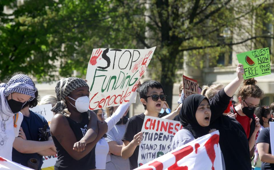 Students and community members gathered for a protest of the Israel-Hamas war Friday, May 3, 2024 on the Pentacrest in Iowa City, Iowa.