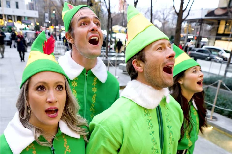 <p>Glen Powell/Instagram</p> Glen Powell and family wearing <em>Elf</em> costumes in New York City