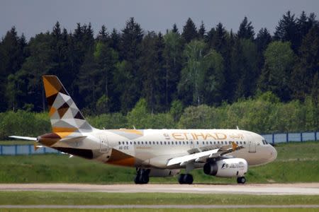 FILE PHOTO: A plane of Etihad Airways company is seen at Minsk international airport near the village of Slabada, Belarus, May 19, 2016. REUTERS/Vasily Fedosenko/File Photo