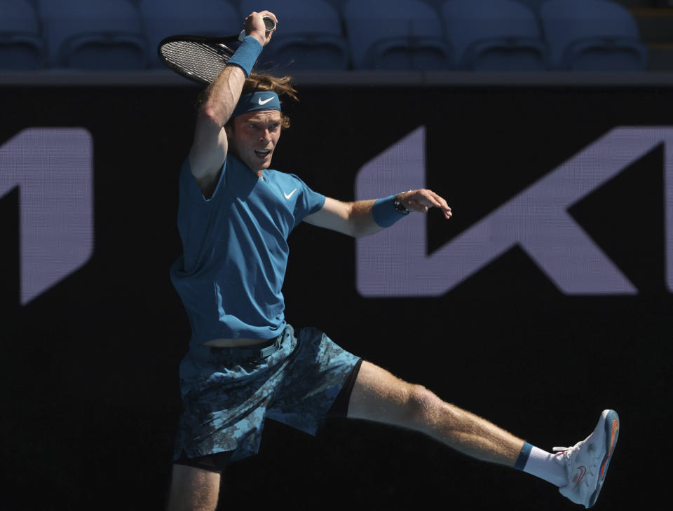 Russia's Andrey Rublev hits a forehand to Norway's Casper Ruud during their fourth round match at the Australian Open tennis championships in Melbourne, Australia, Monday, Feb. 15, 2021. (AP Photo/Hamish Blair)