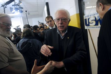 U.S. Democratic presidential candidate Bernie Sanders greets supporters after speaking at a campaign event at United Steelworkers Local 310L in Des Moines, Iowa January 26, 2016. REUTERS/Mark Kauzlarich