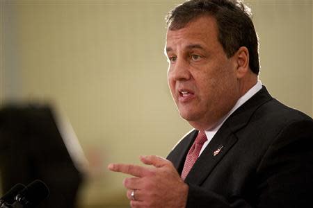 New Jersey Governor Chris Christie makes an education announcement involving a new after-school dinner program for students in need at Dudley Family School in Camden, New Jersey January 23, 2014. REUTERS/Mark Makela